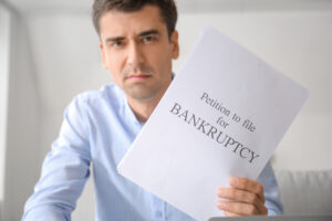 businessman filing a bankruptcy report